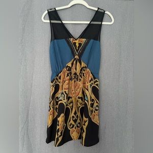 Silky gold black and blue dress with mesh see thru v neck